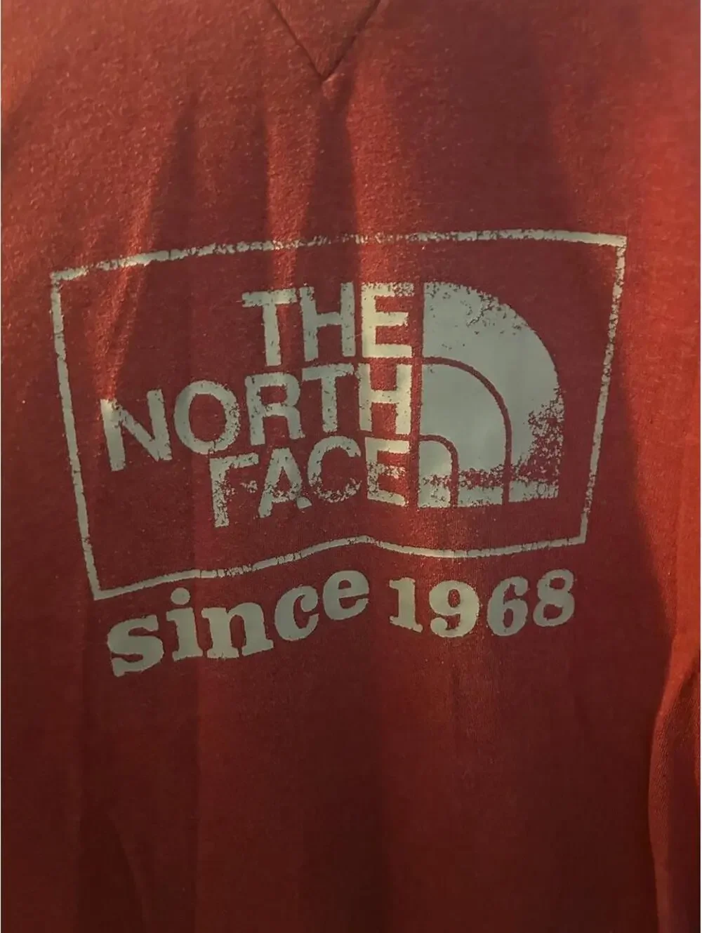 The North Face red sweatshirt with white logo and 'since 1968' text size L